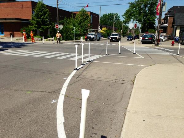 New knockdown sticks mark the bumpouts at Herkimer and Locke (Image Credit: Jason Leach)