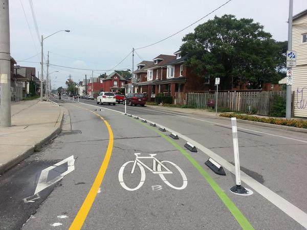 Knockdown bollards and rubber curbing on Cannon west of Sherman