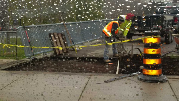 Crew installing walkway in December (Image Credit: City of Hamilton)