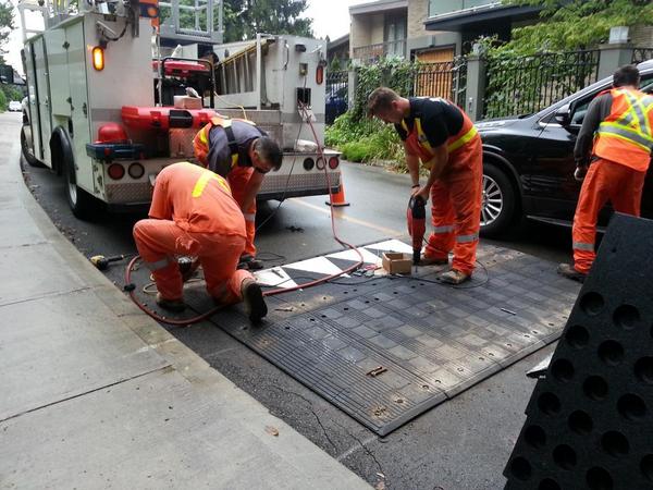 City workers install a speed hump at Glenfern and Mountain (RTH file photo)