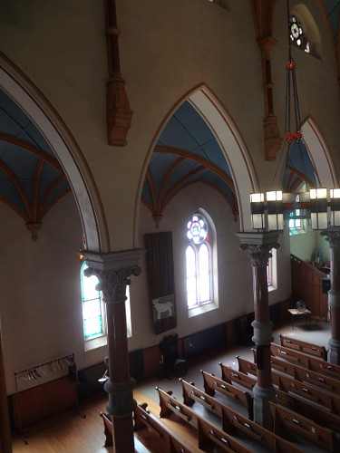 South side flanking arches and stained glass windows