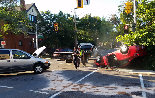 Car flipped upside-down at Queen and Charlton (RTH file photo)