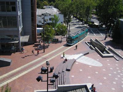 Rapid transit compatible: light rail on pedestrian plaza (Image Credit: Flickr)