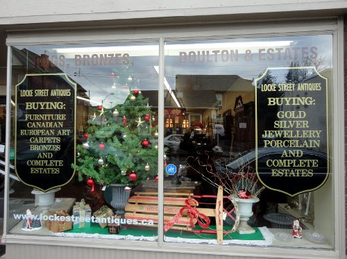 A Christmas tree in the window of Locke Street Antiques, one of the last remaining antique stores