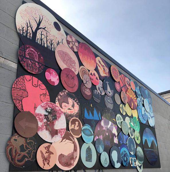 Community art installed on a property bought by Metrolinx for LRT near Wentworth Street