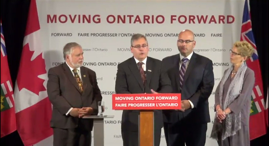 Municipal Affairs and Housing Minister Ted McMeekin, Metrolinx CEO Bruce McCuaig, Transport Minister Steven Del Duca and Premier Kathleen Wynne at the Hamilton funding announcement