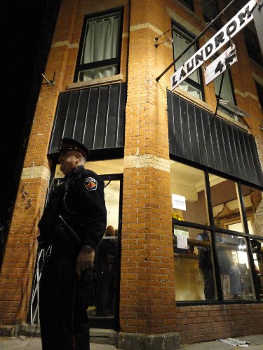 A police officer not required to fend off angry protesters outside the Mulberry Street Coffeehouse