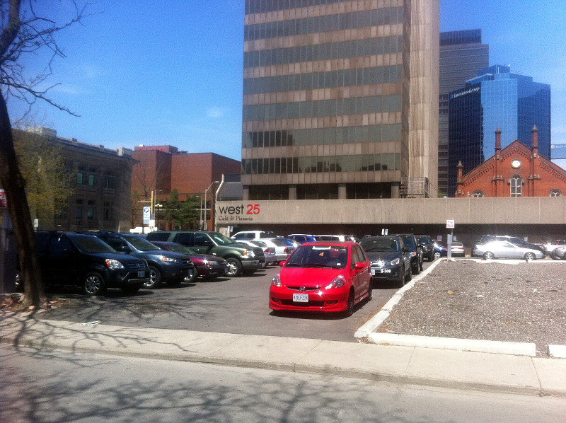 Cars parked on building footprint at 20 Jackson Street West
