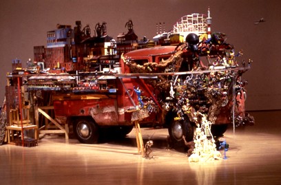 Kim Adams (Canadian b. 1951): Bruegel-Bosch Bus 1996-ongoing - 1960s Volkswagen bus, figurines, mixed media 243.8 x 168.9 x 414 cm