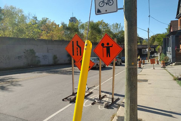 Sidewalk closed on Young west of Wellington