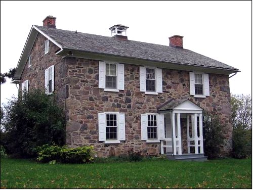 Figure 2. The Brubacher House, Waterloo, built in 1850. John E. Brubacher was the grandson of a German Company shareholder, and son of John Brubacher, who settled in Waterloo in 1816. (Brubacher and see archives for a collection of historical photographs). Some of the stones used to construct this house were unusually large (up to a metre across, but split to a thickness of only about 30 cms).