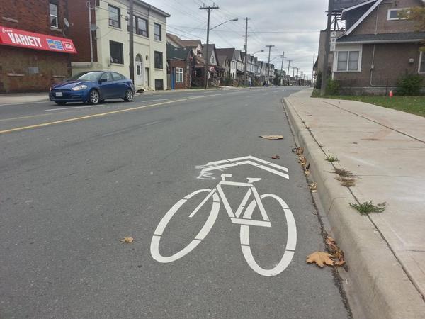 Lonely bike sharrow on Cannon east of Gage