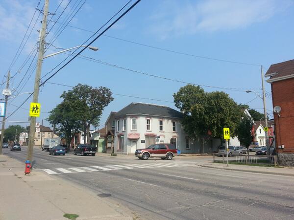 Bright signs telling drivers about the pedestrian crossing