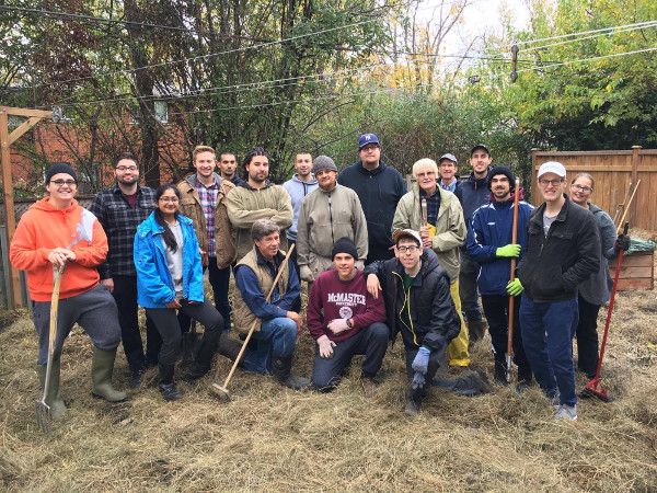 Happy volunteers post-sheet mulch