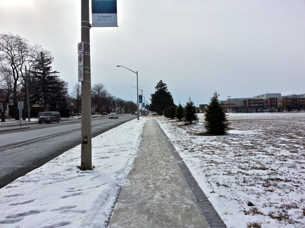 Sidewalk of West 5th looking toward the hospital