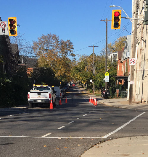 Temporary pylons placed on Charlton at Queen have been slowing vehicle speeds