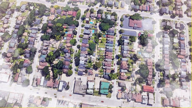 Image 1: View of the current site, a typical laneway in the St. Claire neighbourhood