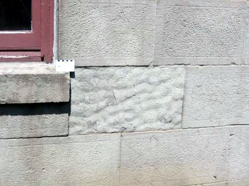 Figure 8. Detail of the stone at the back of the Customs House. Here, the stone blocks were oriented with the bedding vertical, and frost action has caused the surface of one block to flake off, revealing fossil ripple marks.