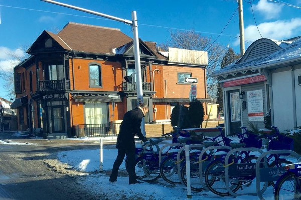 Signing out a Bike Share bike at Locke and Hunter