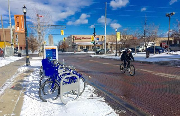 Riding south on Ferguson past a Hamilton Bike Share hub