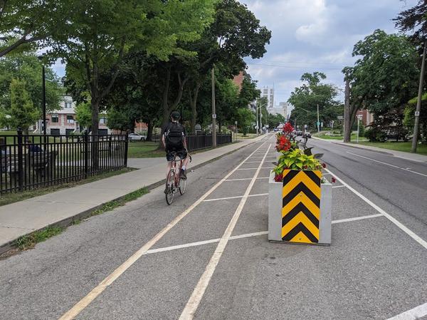 A cyclist rides on the Herkimer bike lane (RTH file photo)