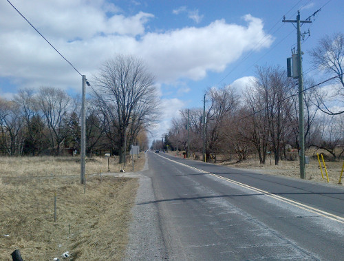 A cold bright April 3. The ditch was full of litter as ditches are when snow melts.