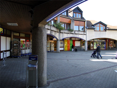 Figure 10: another view of the new village centre of Poisat. There is a supermarket on the left and apartments above