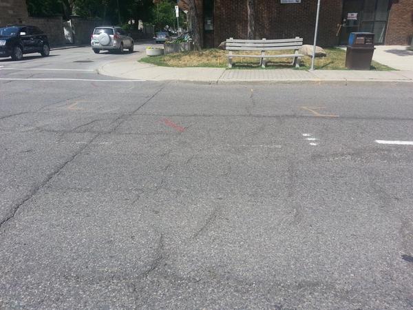 Pavement marking for pedestrian-activated crosswalk
