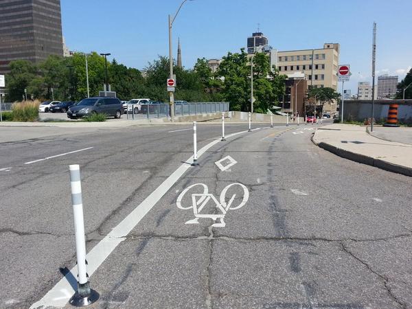 Knockdown sticks on Hunter Street bike lanes just east of Park Street