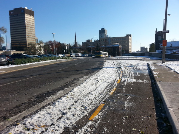 Hunter Street bike lanes covered in ice, November 18, 2014 (Image Credit: Ryan Janssen)