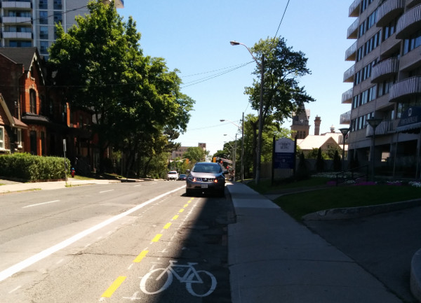 Car parked in bike lanes