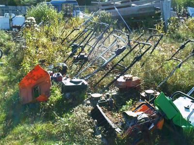 A lawnmower graveyard - in a more perfect world, lawnmower disposal would be a more lucrative business than lawnmower manufacturing. (Image Credit: Flickr)