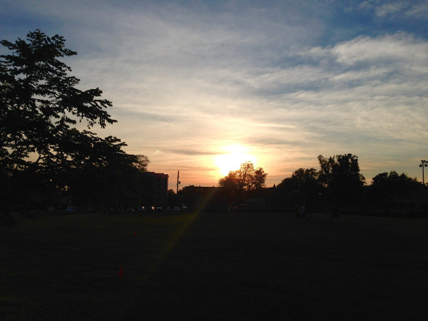 The sun sets over Victoria Park