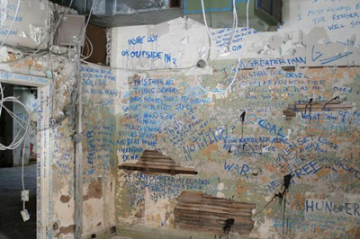 Writing on the wall inside Lister Block (Photo Credit: Joe Ceretti)