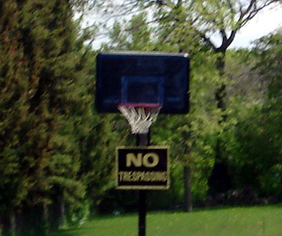 NO TRESPASSING on ... the basketball net