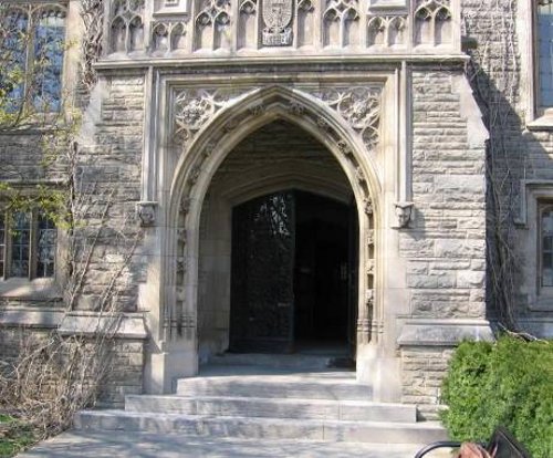 Figure 13. Doorway at University Hall, McMaster University, built in 1929 from Credit River sandstone (rock face, small blocks) and Indiana limestone (door surround and carvings).