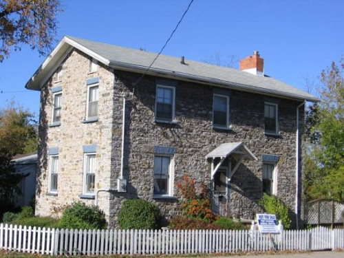 Figure 14. The Lockkeeper's House, 44 King Street, Port Colborne, was built by David Price, stonemason in 1835, and later sold by W.K. Merritt for £30. It is a fine, if simple, two story Georgian house constructed of rubblestone, consisting of blocks of white limestone with abundant dark grey chert, which was certainly quarried locally from the Devonian Bois Blanc Formation. The history is thoroughly documented in the book by David G. Anger, 2006, Port Colborne: Tales from 'The Age of Sail'. Note: the 'not for sale' sign seems unusual to me!