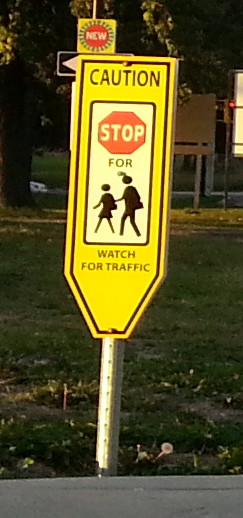'Caution: Stop for Pedestrians' sign at Mohawk College Fennell Campus (RTH file photo)