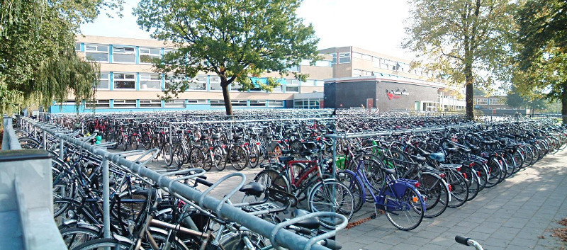 Bikes parked at high school in the Netherlands (Image Credit: A View from the Cycle Path)