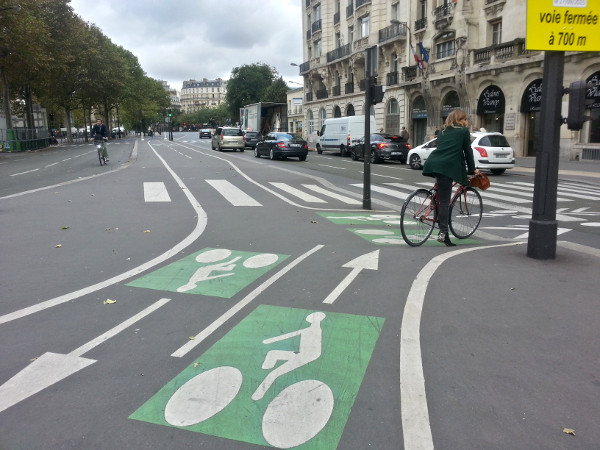Woman riding a bike in Paris (RTH file photo)