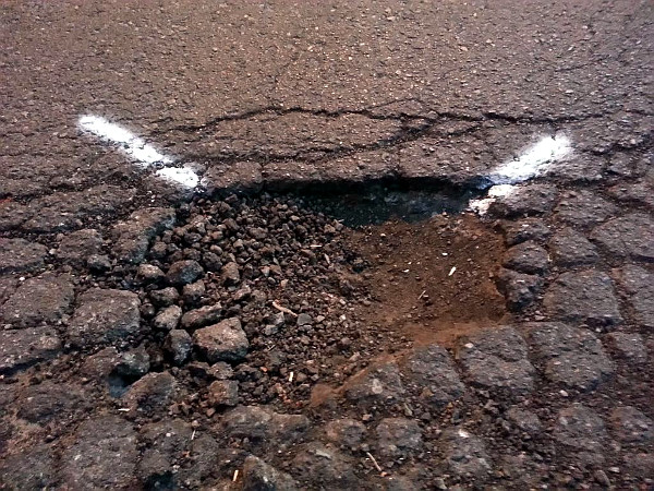 Pothole marked for filling (RTH file photo)