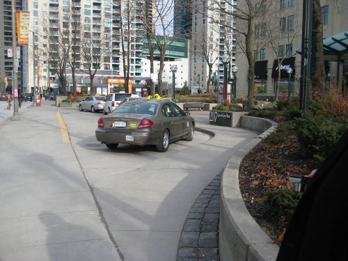 Queens Quay South Side today, near the Queens Quay terminal. Can anyone say, 'Yuk'? (Photo Credit: Waterfront Toronto)