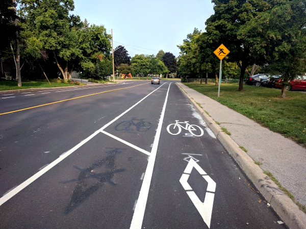 Buffer on left side of bike lane