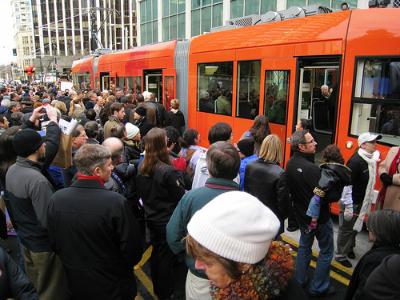 Crowds gather for the inauguration of Seattle's South Lake Union Streetcar (Image Credit: Flickr)