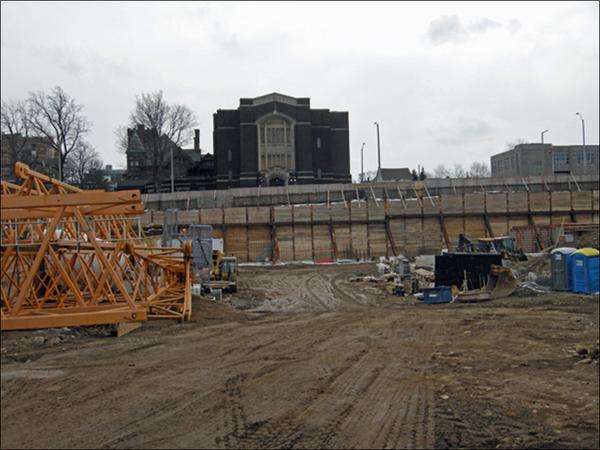 Parking for a six storey building, Vrancor style. South west corner King and Queen, February 2020.