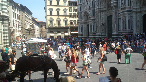 Enjoying gelato and hay at the Duomo, Florence