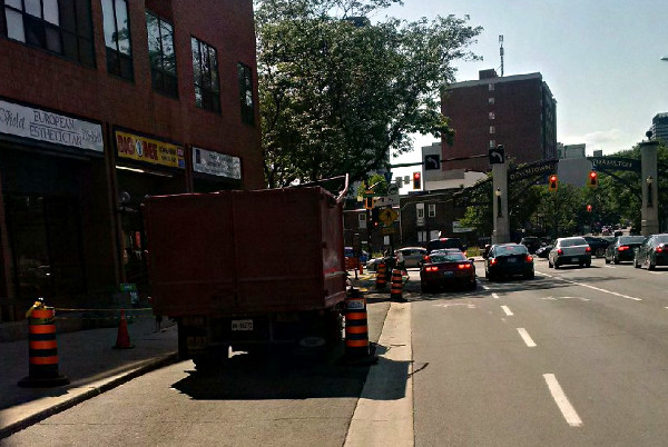 Workers protected and two left-turn lanes maintained