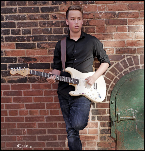 Award-winning blues guitarist Spencer MacKenzie (Image Credit: Bill King)