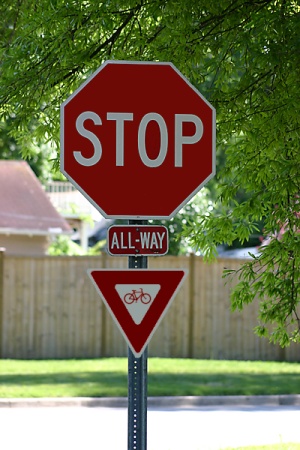 Stop sign with bicycle yield