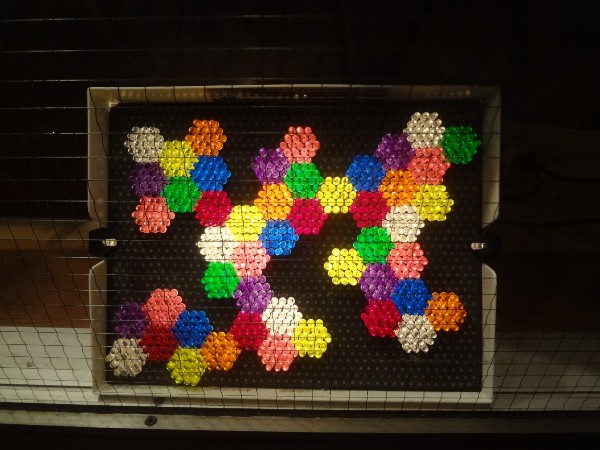 More hexagonal patterns, this time in Lite-Brite